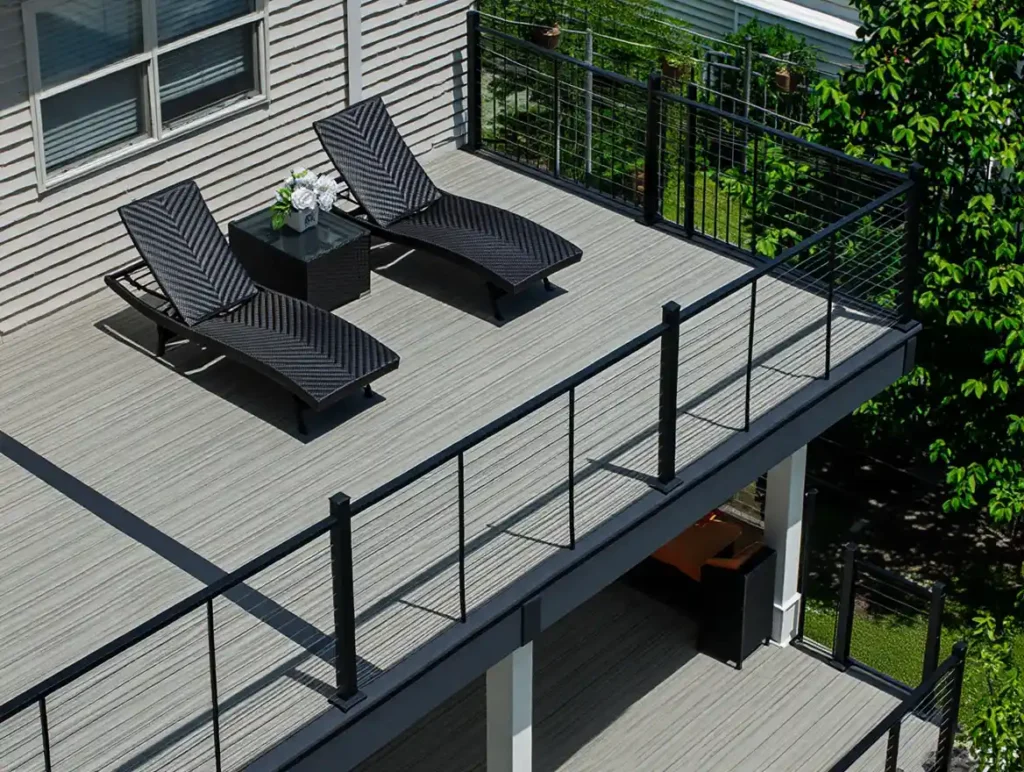 Modern composite deck with cable railings and outdoor furniture showing Stockton Swift Fix deck installation services in Stockton CA for contemporary outdoor design